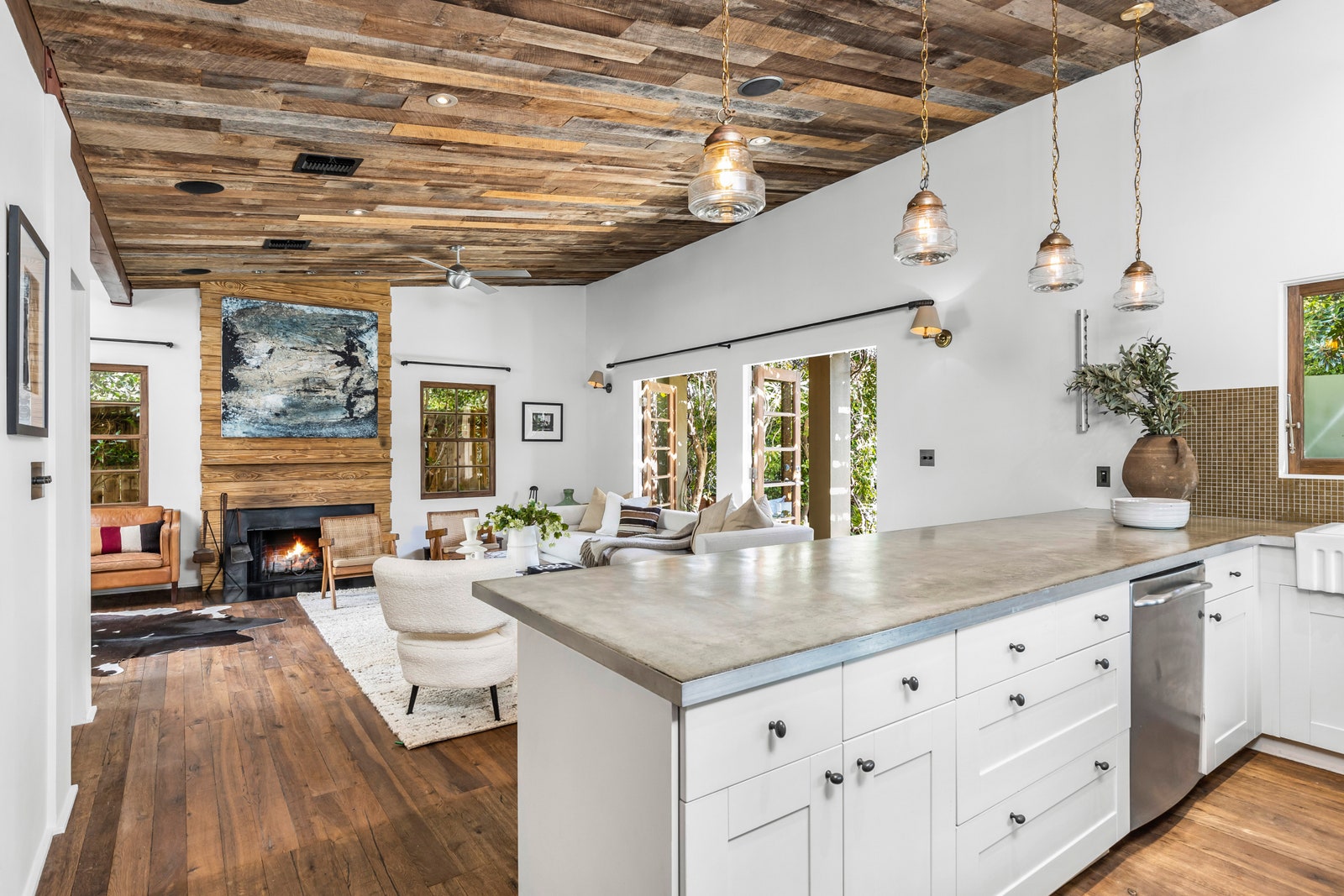 Gray breakfast bar with overhead lighting