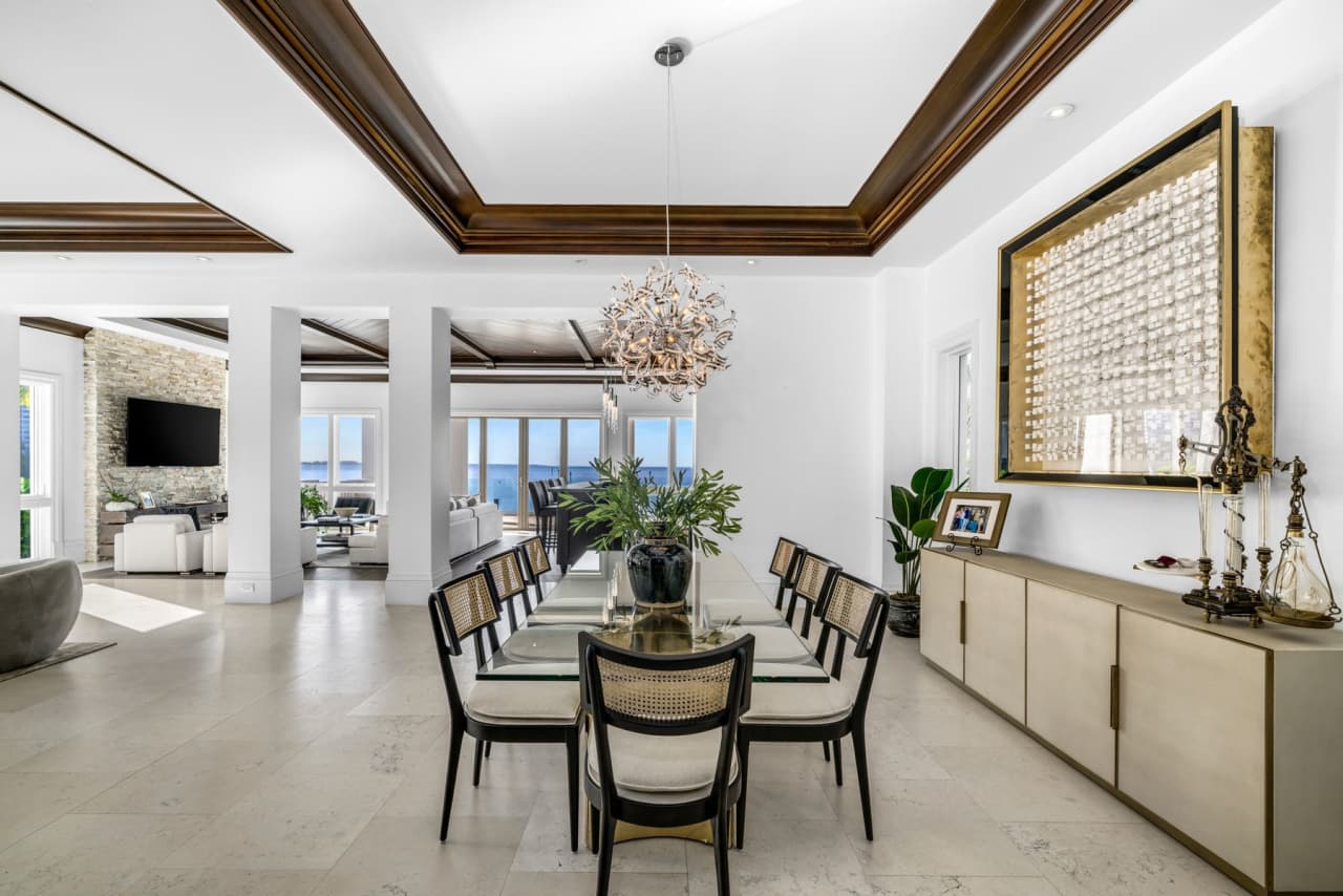 The dining room has a visual connection to the living room. A coved ceiling adds height.