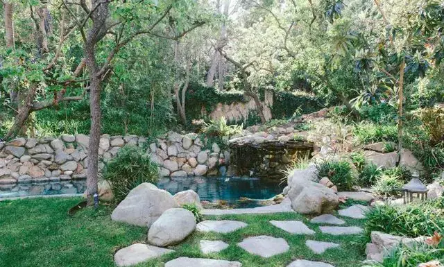 Swimming Pool Beside A Garden