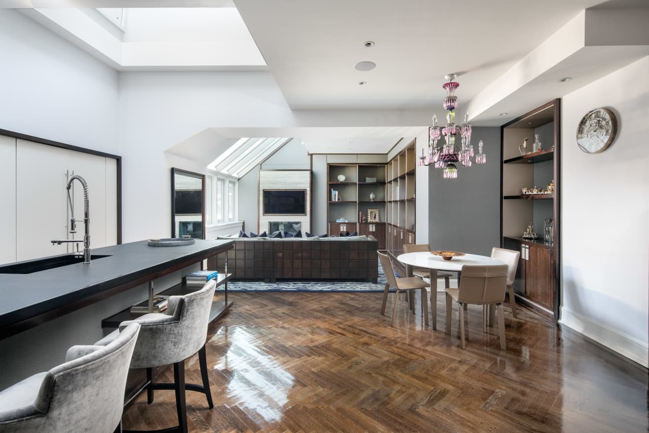 A breakfast nook and family room. 