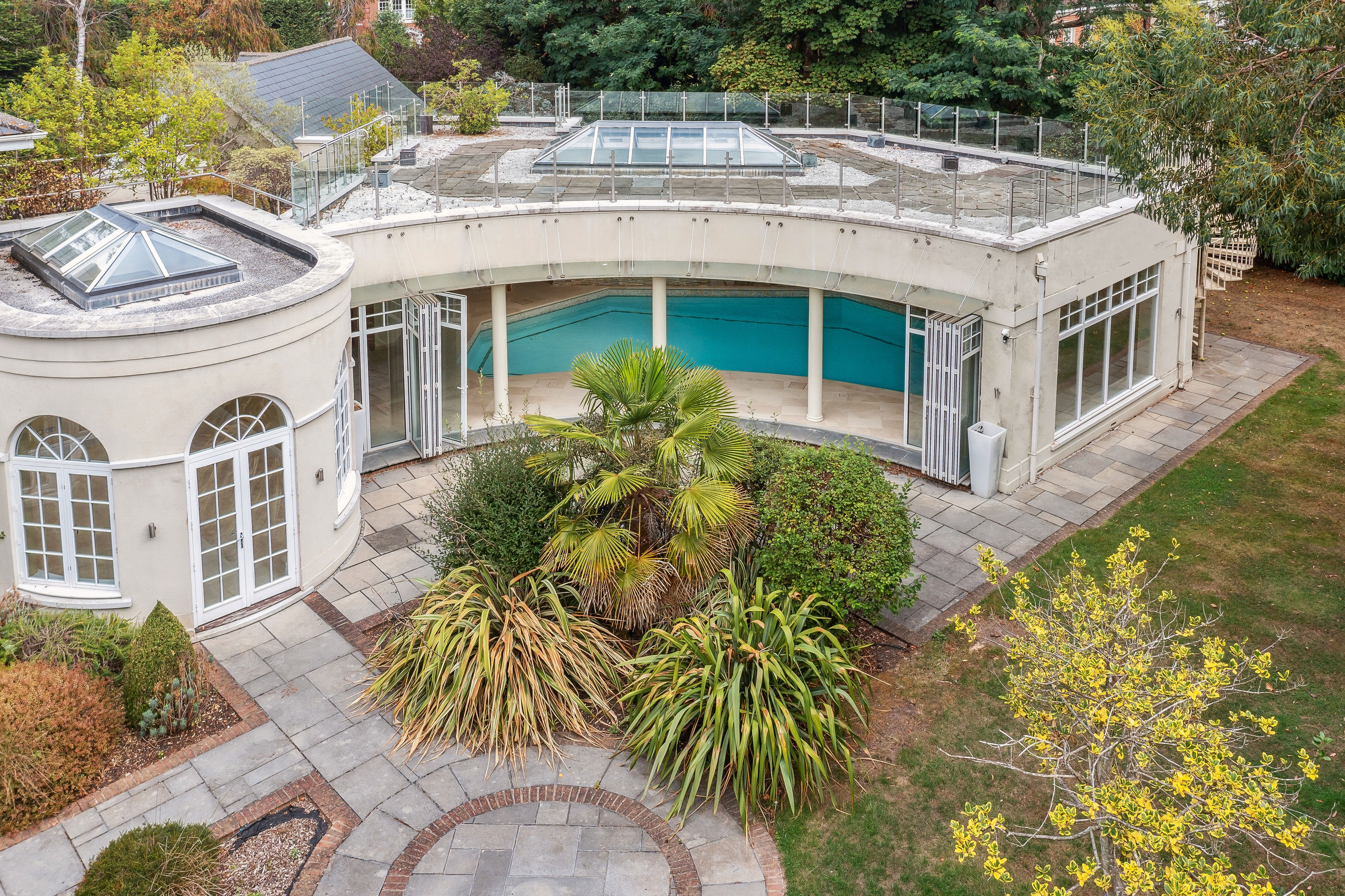 The pool room opens up to the garden