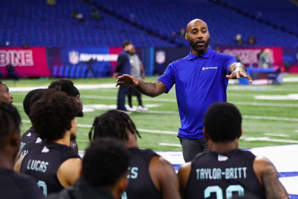 INDIANAPOLIS, INDIANA - MARCH 6: Former NFL player DeAngelo Hall talks to defensive backs during the 2022 NFL Scouting Combine at Lucas Oil Stadium on March 6, 2022 in Indianapolis, Indiana. (Photo by Kevin Sabitus/Getty Images)