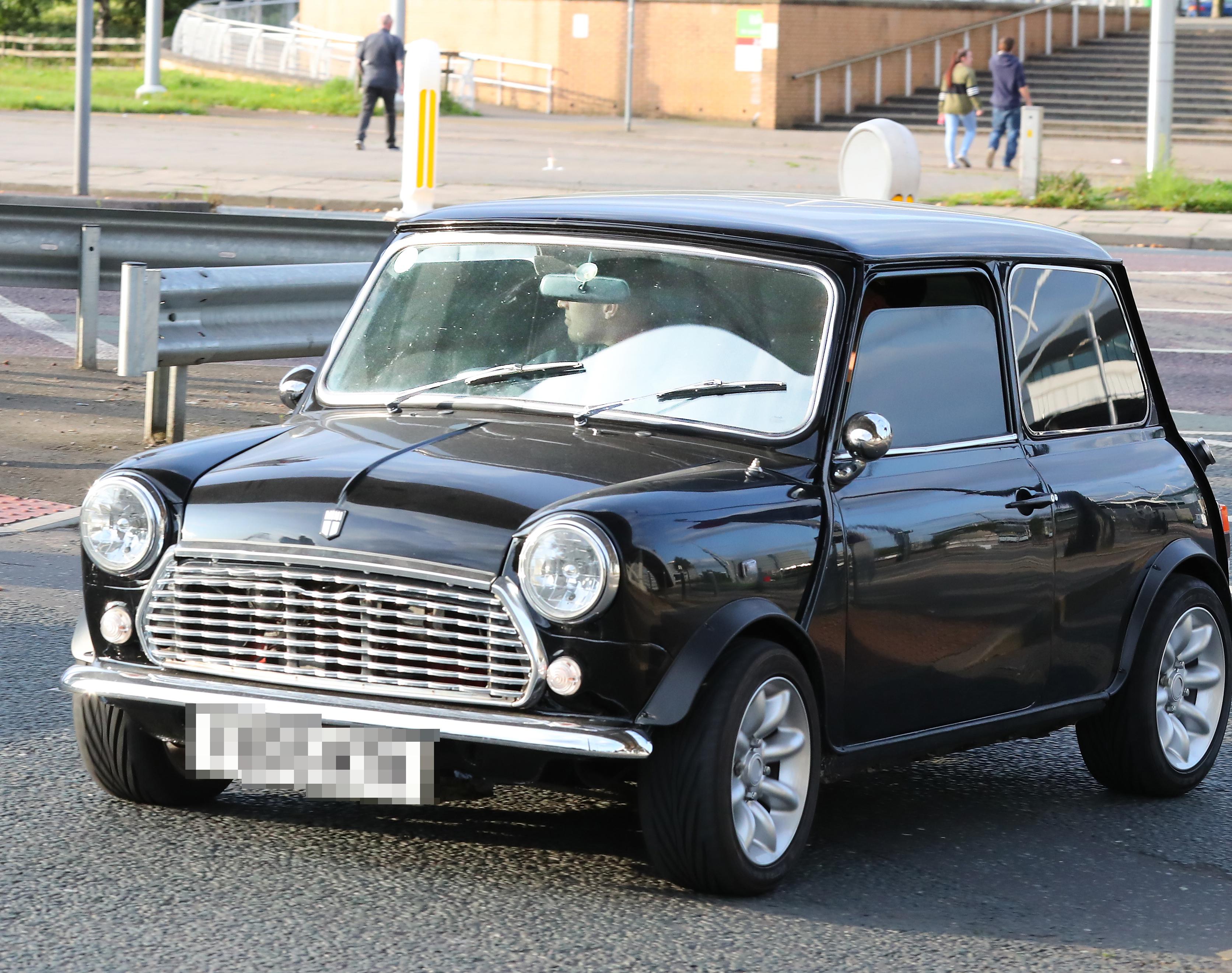  Walker and John Stones were spotted in a £5k Mini Classic in August