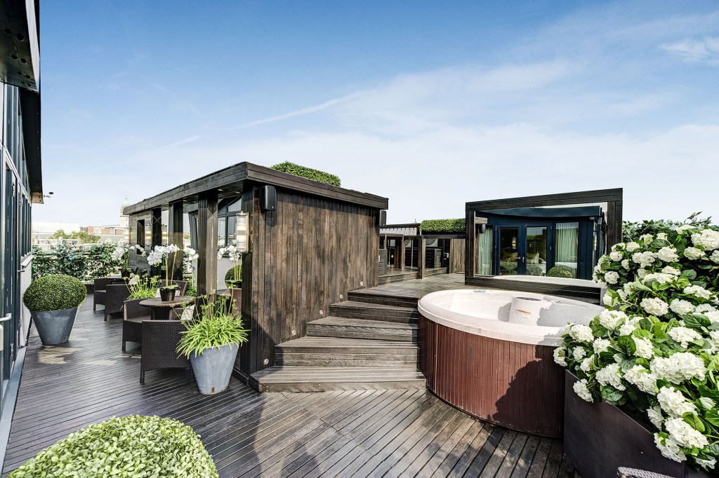 The rooftop with a hot tub.