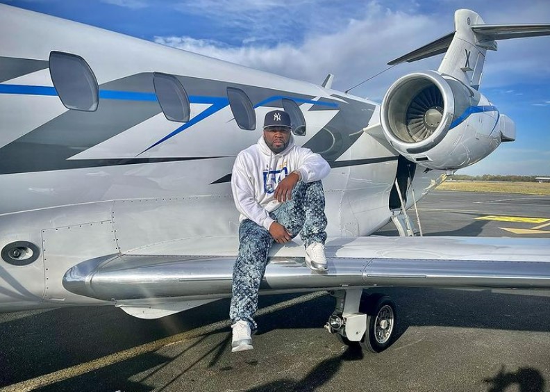 50 Cent Sits on Airplane Wing, Says He's the “Big Wheel Turning” -  autoevolution