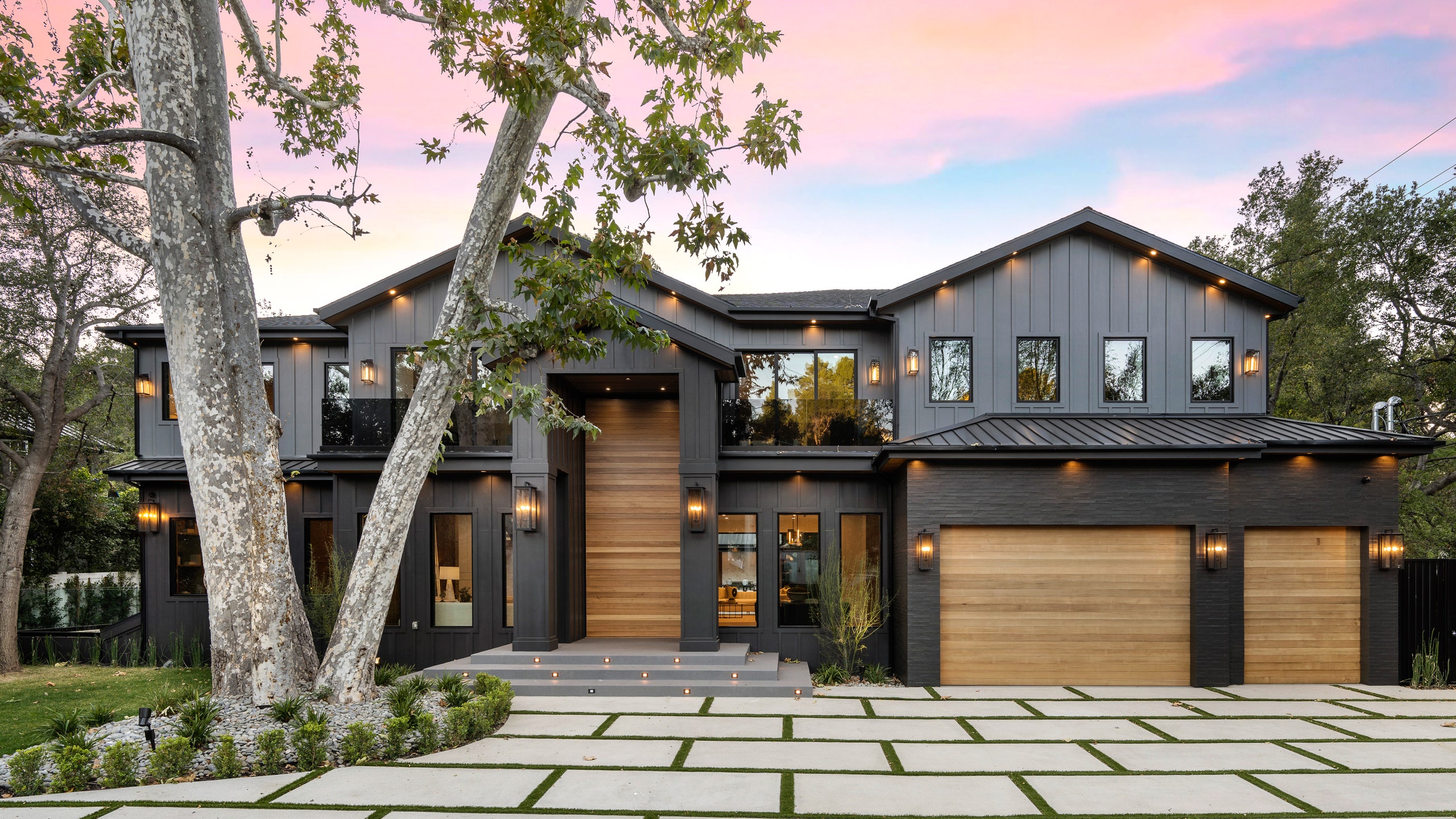 black farmhouse style house owned by actor Michael B. Jordan