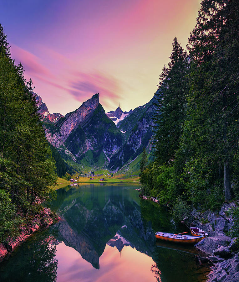 Sunset over the Seealpsee lake with small boats in the Swiss Alps,  Switzerland #1 Photograph by Miroslav Liska - Pixels