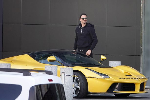 Milan AC soccer player Zlatan Ibrahimovic drives his limited production hybrid sport car Ferrari on February 24, 2021